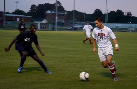 Cody Styx attacks the ball on offense. Union University men's soccer team open's off the season with a win over Wallace State Community College, 4-1. 
 - Photo by Ebbie Davis