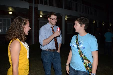 Art majors Katherine Crutcher, Rob Alvey, and Kristen Marks chat outside before Movie on the Lawn, hosted by SAC. - Photo by Ebbie Davis
