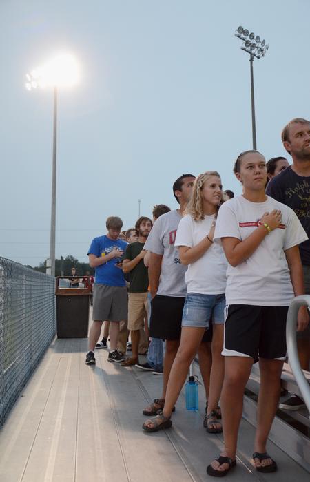 Union students stand for the national anthem at the beginning of the Union University soccer game against Notre Dame College.  - Photo by Zac Calvert