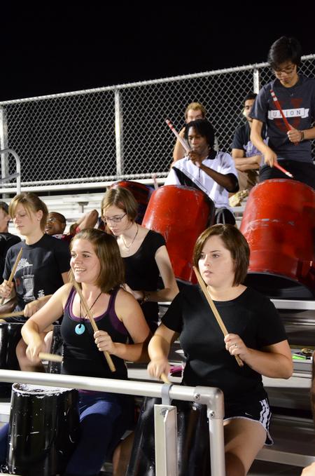 Liz Johnson, freshman music major, Ashley Payton, sophmore elementary education major, and other Union students play for the Union drumline as the men's soccer team plays against Notre Dame College. - Photo by Zac Calvert