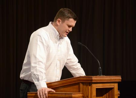 Union alumnus Grant Gaines leads a prayer during chapel. - Photo by Jacob Moore