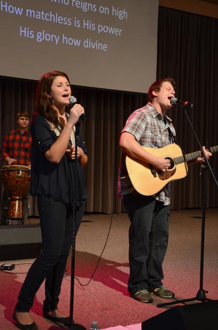 Bethany Gaines, freshman elementary education major, sings during chapel alongside Ryan Wingo, worship leader at Bellevue Baptist Church in Cordova, Tenn. - Photo by Jacob Moore