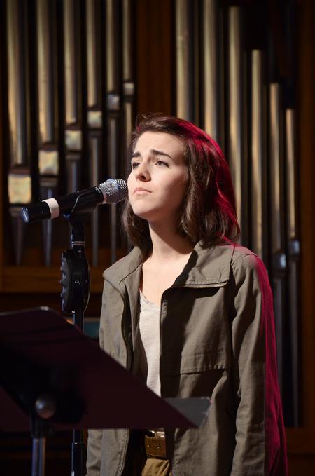 Natalie Wittman, senior English major, leads music for chapel. - Photo by Zac Calvert