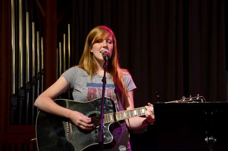 Olivia Wallace, sophomore elementary education major, sings during Family Weekend chapel. - Photo by Jacob Moore