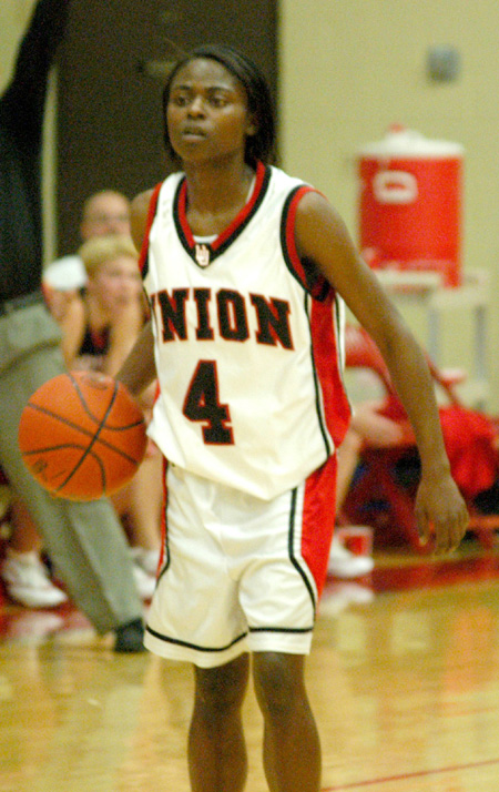 Sophomore guard Latorya Fuller looks over the defense as she runs the point in Union's win over Martin Methodist. - Photo by Steven Aldridge