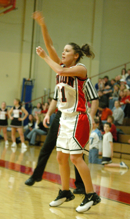 Sophomore guard Jennifer Henson pass the ball into the post in a win over Martin Methodist. - Photo by Steven Aldridge