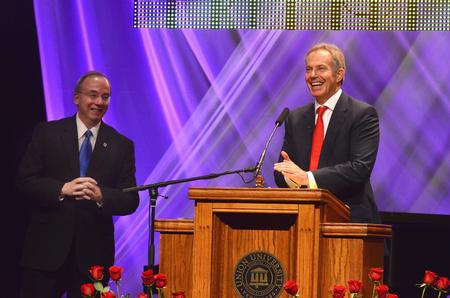 Tony Blair, former British prime minister, laughs while answering a question asked by David Dockery, president of the university, during the 2011 Scholarship Banquet. - Photo by Jacob Moore
