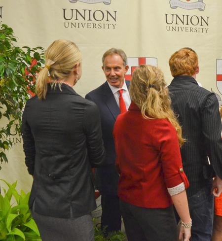 Former British Prime Minister Tony Blair visits with Union University students after the Scholarship Banquet. - Photo by Morris Abernathy