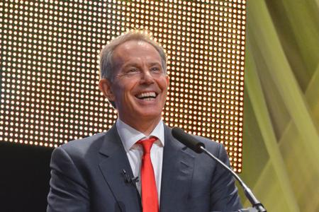 Former British Prime Minister Tony Blair reacts to one of Dr. Dockery's questions at the 14th Annual Scholarship Banquet. - Photo by Morris Abernathy