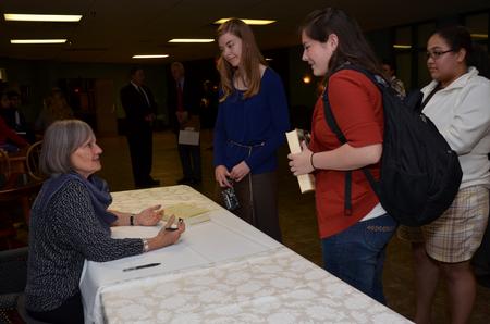 Pauline Maier, the William R. Kenan Jr. Professor of American History at the Massachusetts Institute of Technology, talks to Union students, Vicki Searl (left), freshman music major, and Joanna Huffman, freshman social work major, after the Carls-Schwerdfeger History Lecture. - Photo by Anne Richoux