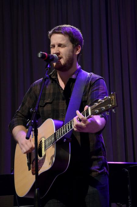 TJ Hester, senior philosophy major, sings with Union's worship band at the beginning of chapel.  - Photo by Anne Richoux