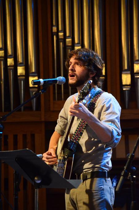 John Griffith, sophomore English major, plays the banjo and sings before Poly Rouse, senior pastor of Hermitage Hills Baptist Church, gives the message in chapel. - Photo by Zac Calvert