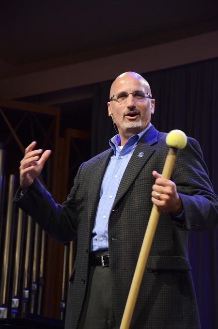 Poly Rouse, senior pastor of Hermitage Hills Baptist Church, speaks about using the tools God has given to us. Rouse uses a stick with a tennis ball as an example of a man who used it to clean scuff marks on the floor of an airport and how he did it to the best of his ability.  - Photo by Zac Calvert