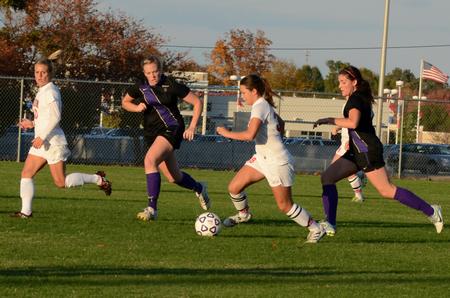 Ashlie Watson fights for possession against Trevecca Nazarene University opponents on Senior Night.  - Photo by Anne Richoux