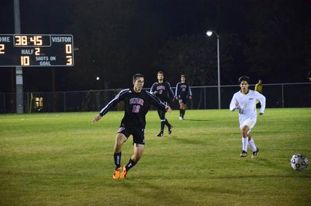 Jamie Fox rushes for the ball during Senior Night against Trevecca Nazarene University.  The Bulldogs beat Trevecca 2-0. - Photo by Zac Calvert