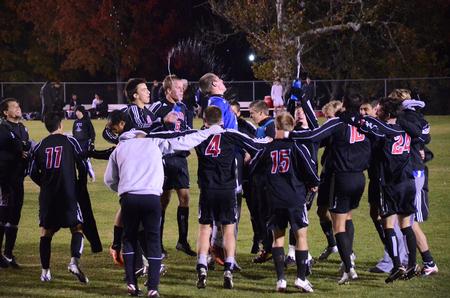 The Bulldog Soccer Team celebrates a 2-0 victory against Trevecca Nazarene University in the last match of the season. - Photo by Zac Calvert