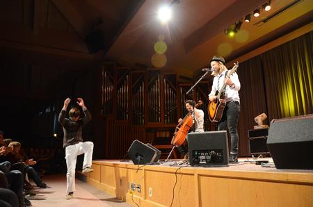 Kyle Gallop, freshman English major, dances while musician Jon Foreman performs in the Homecoming Concert in the G.M. Savage Memorial Chapel. - Photo by Zac Calvert
