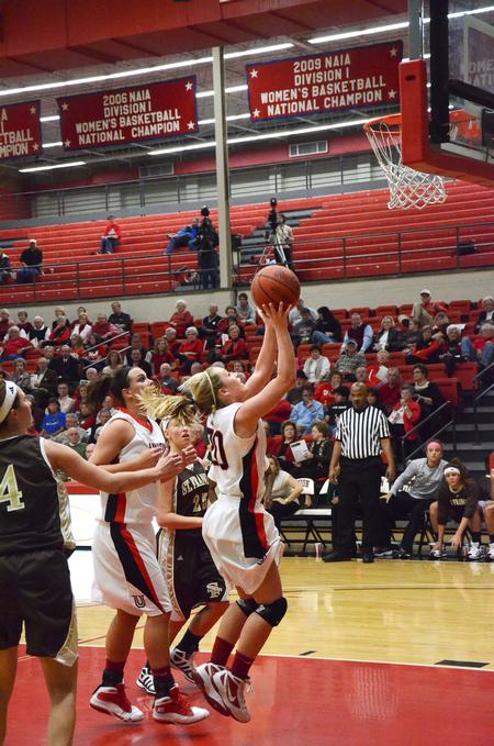 Amy Philamlee goes up for a lay-up during the Homecoming game against St. Francis. - Photo by Zac Calvert