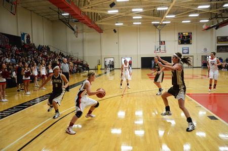 Amy Philamlee dribbles around St. Francis defense during the Homecoming game. The Lady Bulldogs went on to win 82-45. - Photo by Zac Calvert