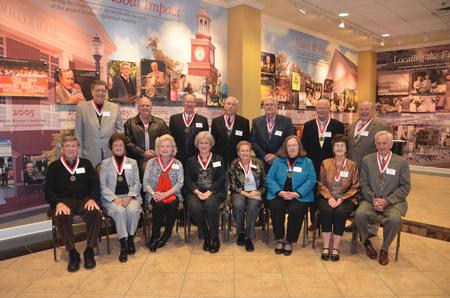 Members of te class of 1962 gather for their reunion photograph. - Photo by Morris Abernathy