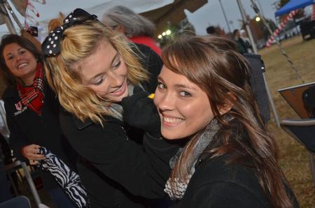 Union University cheerleader Lindsey Blackwood gets her face painted at "Union Night" on the Great Lawn. - Photo by Morris Abernathy