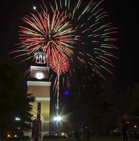 Homecoming 2011 brought a new look for Miller Tower on the campus of Union University.  Fireworks lit up the night sky for friends, students and faculty gathered on the lawn. - Photo by Morris Abernathy