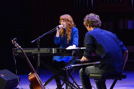Brooke Waggoner talks to the audience during the Homecoming Concert held in the G.M. Savage Memorial Chapel. - Photo by Jacob Moore