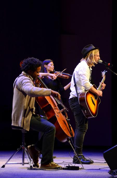 Cellist Keith Tutt, violinist Ann Marie Calhoun and Jon Foreman, musician and lead vocalist of Switchfoot, perform during the Homecoming Concert. - Photo by Jacob Moore