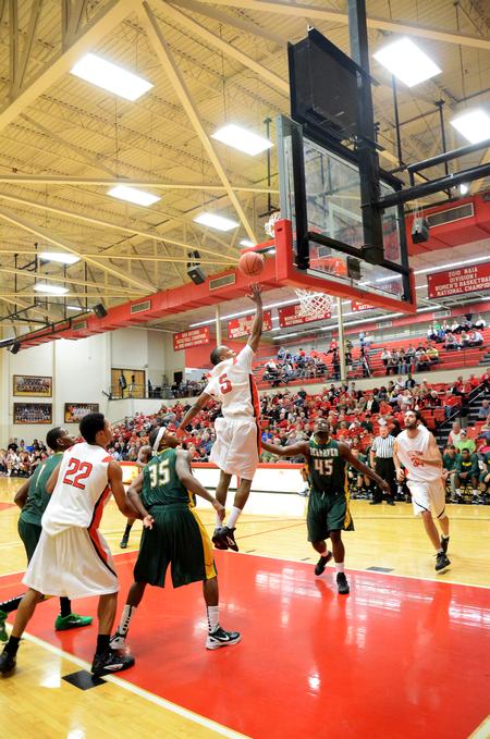 Skyler Vaden jumps for a lay-up during the Bulldog basketball homecoming game against Belhaven. - Photo by Zac Calvert
