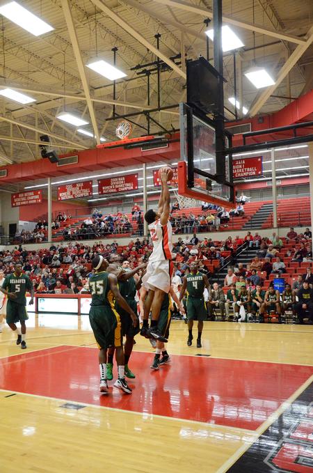 Leventrice Gray goes in for a dunk during the Bulldog basketball homecoming game against Belhaven. - Photo by Zac Calvert