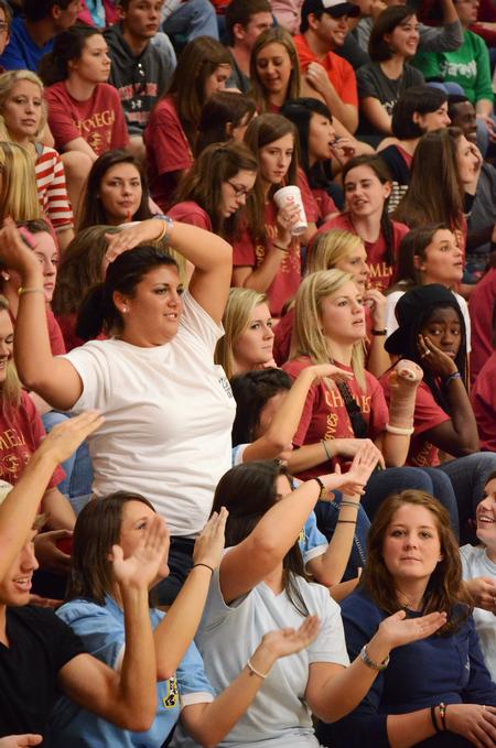 Bridget Roney, senior sports management major, cheers during a timeout of the Bulldog Basketball homecoming game against Belhaven. The Bulldogs won the game 87-66. - Photo by Zac Calvert