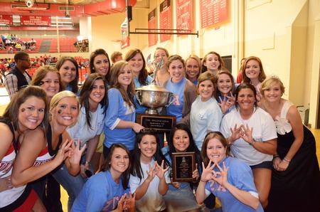 The ladies of Zeta Tau Alpha celebrate as they win the Presidential Homecoming Cup during the Union Men's Basketball homecoming game against Belhaven. - Photo by Zac Calvert