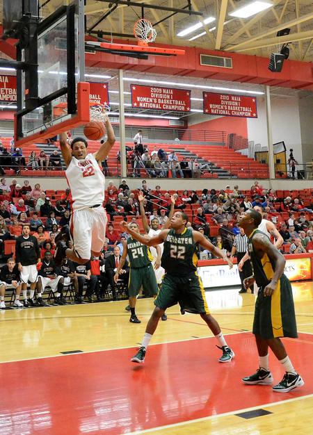 Leventrice Gray dunks the ball during the Bulldog basketball homecoming game against Belhaven. - Photo by Zac Calvert