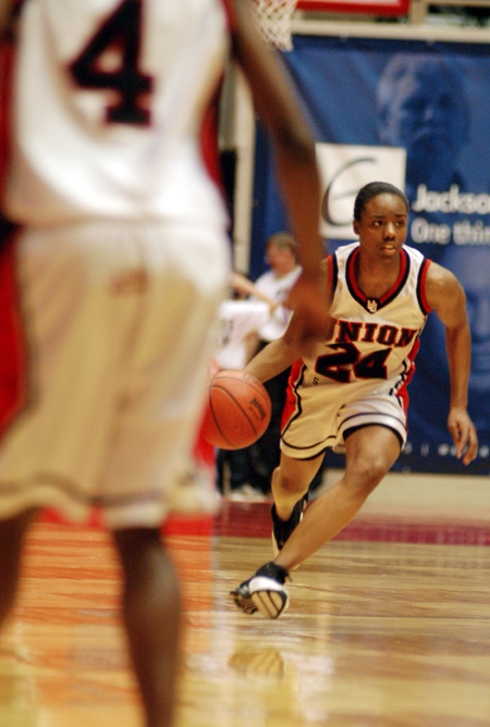 Monica Elliot (24) starts a fast break during for Union during the NAIA National Tournament. - Photo by Kristen Nicole Sayres
