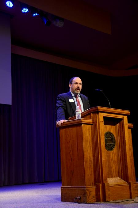 Scott Huelin, director of the honors community and associate professor of English, speaks in chapel. - Photo by Ebbie Davis