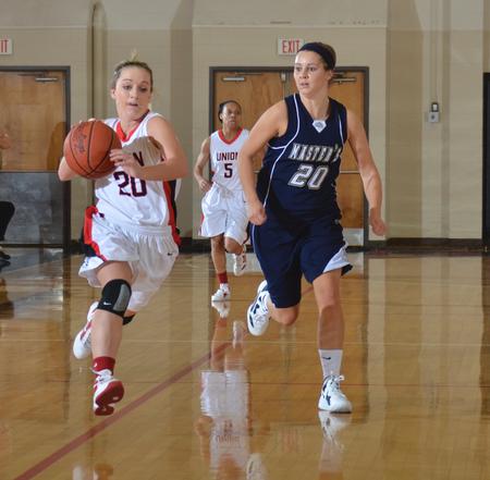 Lady Bulldog's Amy Philamlee uses her speed to bring the ball into play during the Rotary Classic - Photo by Morris Abernathy