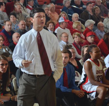 Head Coach Mark Campbell makes adjustments during the game against Westminster College. - Photo by Morris Abernathy