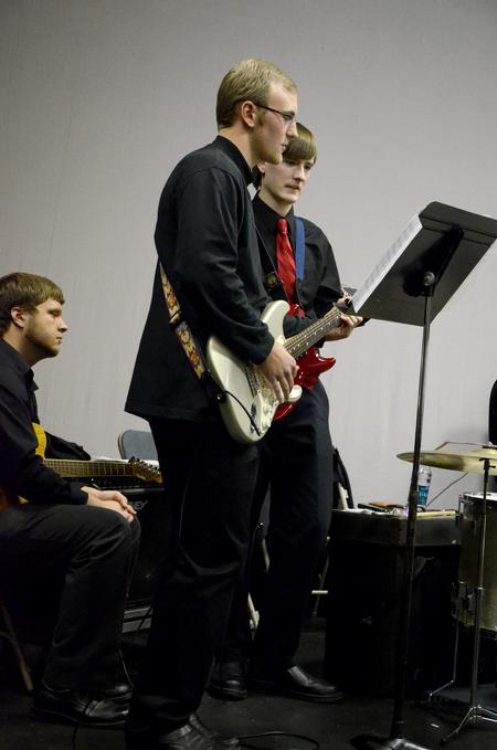 Guitarists Daniel Hodges, junior biblical studies major, and Jesse Joyner, sophomore music major, perform during the Fall 2011 Jazz Band Concert. - Photo by Jacob Moore