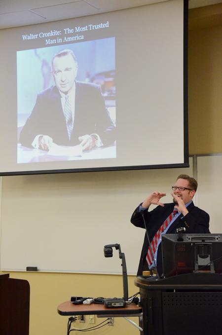 Hunter Baker, associate professor of political science, speaks during a Town & Gown session in Providence Hall. - Photo by Zac Calvert