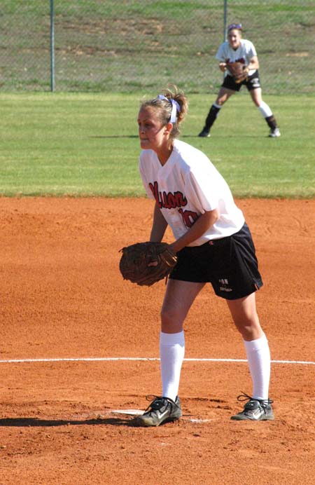 Senior Leah Gronberg (10) starts her wind-up. - Photo by Steven Aldridge