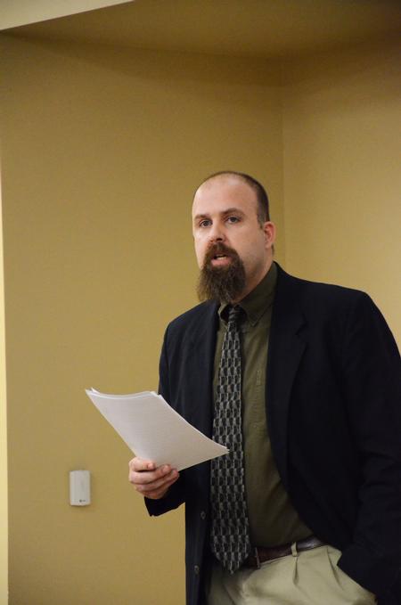 Micah Watson, assistant professor of political science, speaks on the fractioning of America's news and politics during the Media, Politics & Democracy Town & Gown session in Providence Hall. - Photo by Zac Calvert