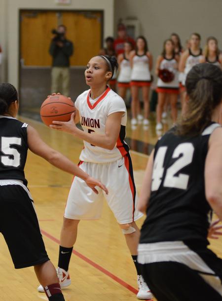 Photo by Jacob Moore
Lady Bulldog LaTesa McLaughlin looks for a pass during a game Feb. 11 against Freed Hardeman at the Fred DeLay Gymnasium. - Photo by Jacob Moore