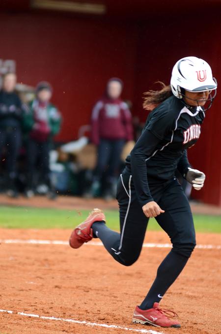 Alex Williams runs to first base during Union's season opener versus William Woods (Mo.).   - Photo by Anne Richoux