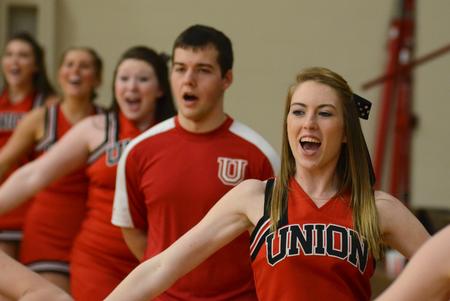 Photo by Jacob Moore
Cheerleader Elizabeth Atkins gets the crowd excited during a basketball game against Cumberland University Feb. 13 at the Fred DeLay Gymnasium. - Photo by Jacob Moore