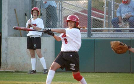 Cassandra Ramos (6) makes contact as she drives the ball to the opposite field for a hit during a Union over Cumberland. - Photo by Heidi Davis