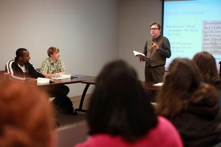 Students listen as Gavin Richardson, professor of English, gives a lecture. - Photo by Kristi McMurry Woody