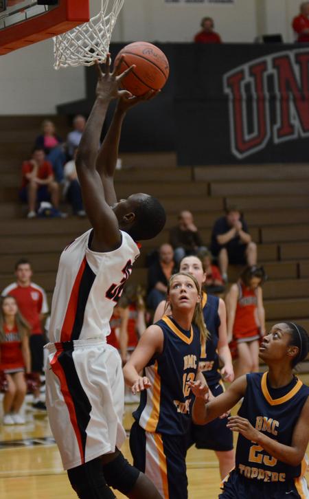 Mildred Olumasi goes up for a shot during a game against Blue Mountain College. - Photo by Jacob Moore