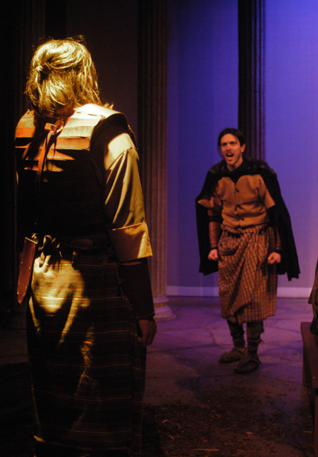 Ryan Schunemann as Macbeth reacts to the ghost of Banquo played by Stephen Kennedy in <i>Macbeth</i>. - Photo by Jim Veneman