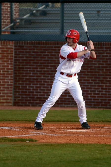 Clint Barnes bats during a double-header against Taylor University. The bulldogs won the first of the two games. - Photo by Anne Richoux
