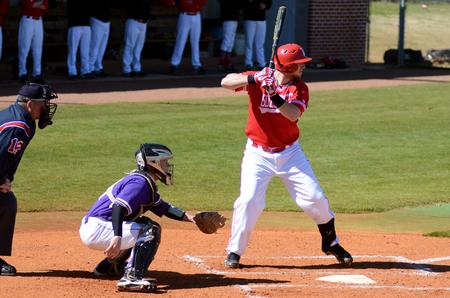 Doug Joyce steps up to bat during a weekend double-header against Taylor University.  - Photo by Anne Richoux